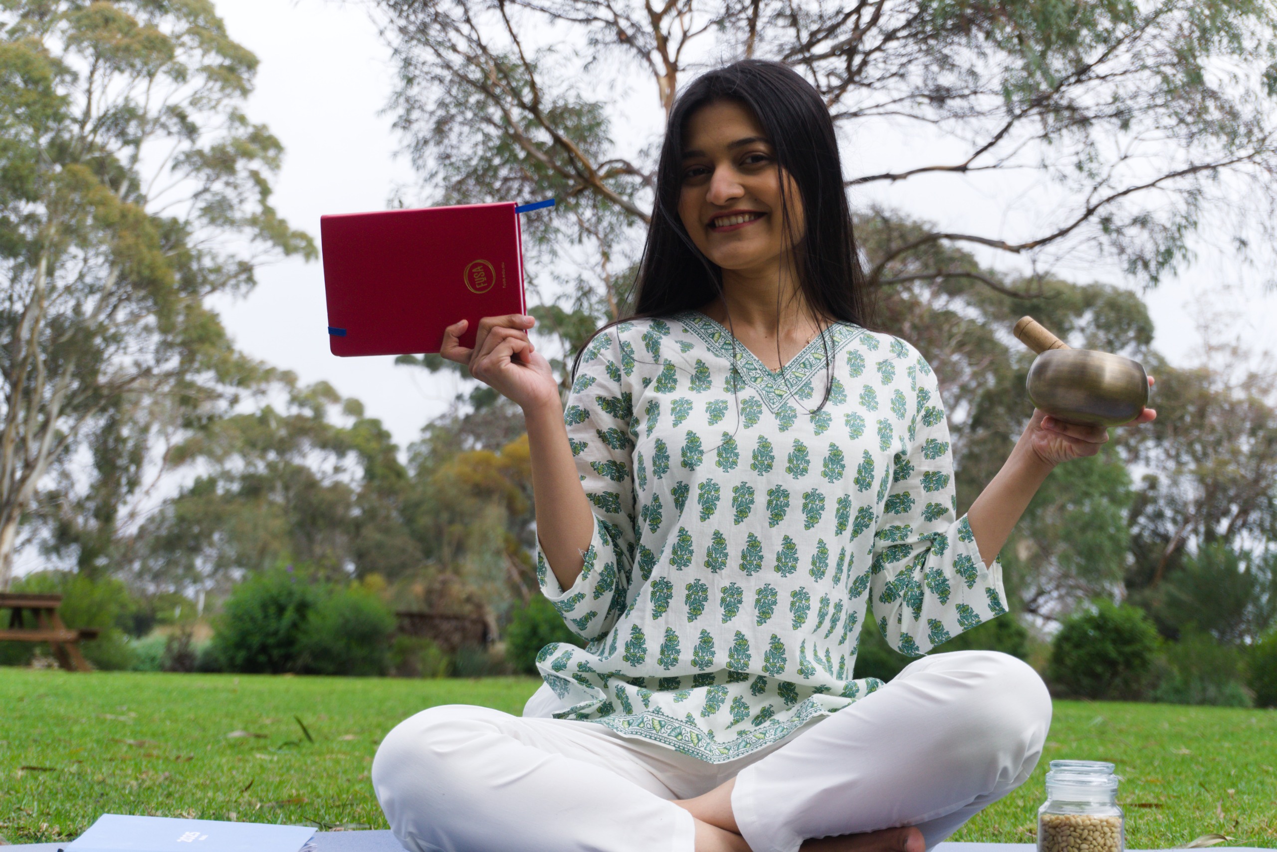 Vidhi Jain with wellness credentials and traditional singing bowl